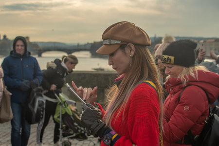 Editorial â December 15thPrague, Czech Republic. 01-11-2020. Tourists are walking on the Charles Bridge on Historical town.のeditorial素材