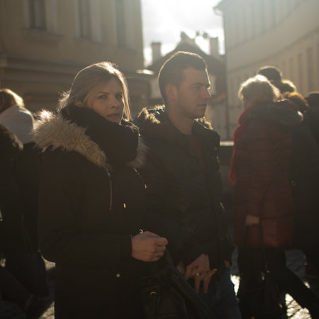Prague, Czech Republic. 01-11-2020. Tourists are walking on the Charles Bridge on the Historical town in Prague. Couple walking at the Charles Bridge in Prague.のeditorial素材