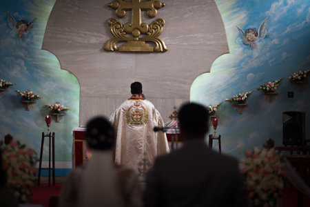 Kerala, India, 08-12-2017. Bride and groom closer to the altar. Catholic wedding in the Province of Kerala in South India. Religious celebration at church.のeditorial素材