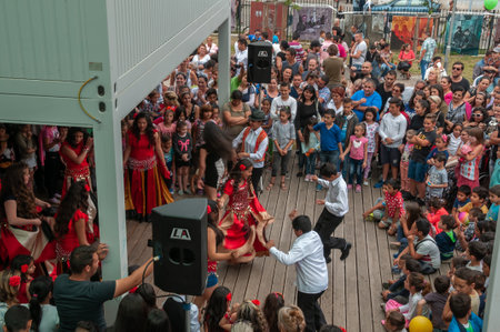 Brno, Czech Republic. 06-11-2016. Adolescents having fun at a Festival of Roma people (Gypsies) in Brno attended by people from the community, with activities for children and adolescents.のeditorial素材