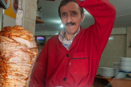 Istanbul, Turkey. 05-23-2018. Muslim male working selling kebabs on the streets of Istanbul in Turkey.のeditorial素材