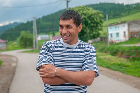 05-16-2018. Lomnicka, Slovakia. A Roma or Gypsy male is smiling in a abandoned community in the heart of Slovakia, living in miserable conditions.のeditorial素材
