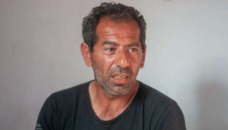 5-16-2018. Lomnicka, Slovakia. A close-up of a Roma or Gypsy male in an abandoned community in the heart of Slovakia, living in miserable conditions.のeditorial素材