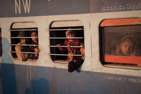 Jaipur, India. 09-05-2018. Portrait of a family waiting the train to start at the main train station in Jaipur.のeditorial素材
