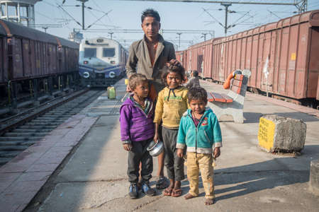 Varanasi. India. 11-02-2018. Portrait of a group of children spending time at the Varanasi train station.のeditorial素材