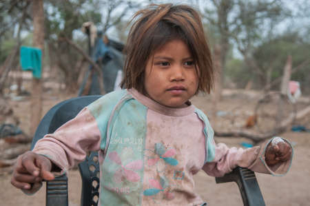 Chaco Province. Argentine. 15-01-2019. Portrait of an indigenous girl at her village in the Chaco Province, North of Argentine.のeditorial素材