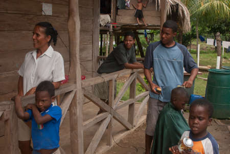 Darien Province, Panama. 07-18-2019. An afro descendent from the Darien Province, in Panama, Central America, is receiving a hair cut.のeditorial素材