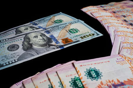 Argentine Dollars and Pesos.