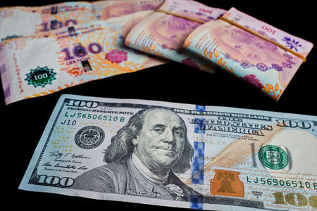 Argentine Dollars and Pesos.