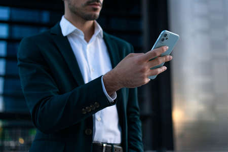Man using mobile phone with copy spaceの写真素材