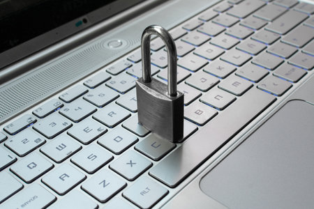 Padlock on a laptop keyboard. Internet security concept. Close up.の写真素材