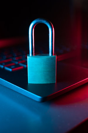 Padlock on the laptop keyboard. Cyber security concept. Close up.の写真素材