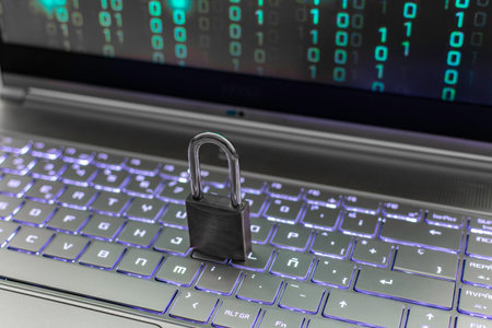 Laptop with padlock on keyboard, closeup. cyber security conceptの写真素材