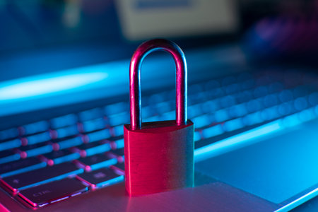 Padlock on a laptop keyboard close-up. internet security conceptの写真素材