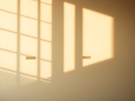 Shadow of the window on the wall. Sunlight through the window.の素材