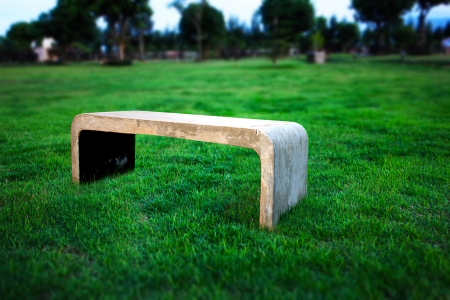 The concrete bench in the yard