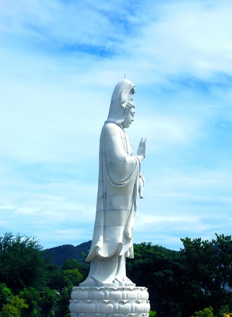 GuÄn YÄ«n (Goddess of Mercy or Avalokitesvara) statue at Wat Thungsamor, Kanchanaburi, Thailand (Goddess of Mercy or Avalokitesvara) statue at Wat Thungsamor, Kanchanaburi, Thailandの写真素材