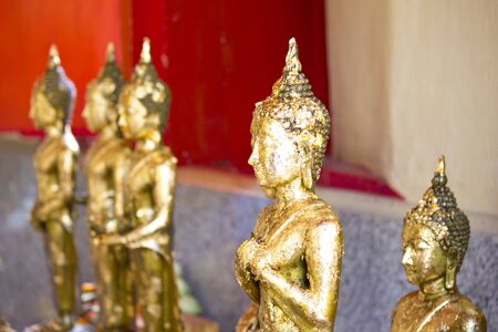 The Buddha statue covered with gold leafの写真素材