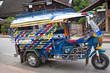 The colorful motor-tricycle in Laung Prabangのeditorial素材