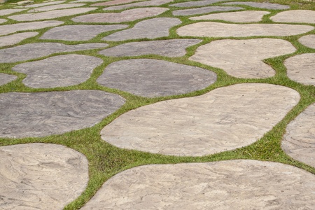 The pavement made of free form rock and grass