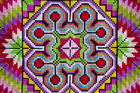 Colorful cross-stitch cloth backgroundの写真素材
