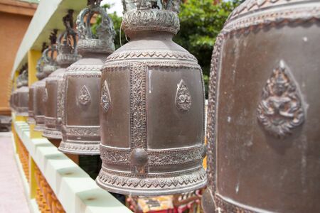 Row of Bronze temple bells at the temple