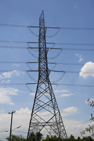 High voltage electric tower under the blue skyの写真素材