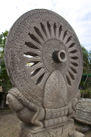 Wheel of the law with carving patternの写真素材