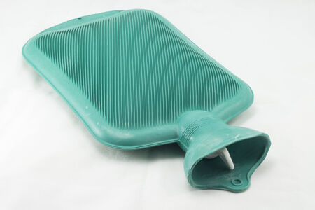 Green hot rubber bag isolated on white backgroundの写真素材