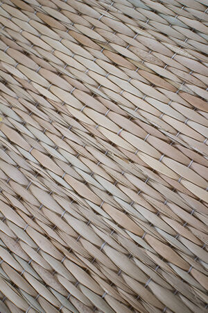 Brown mat made of natural materiial, background