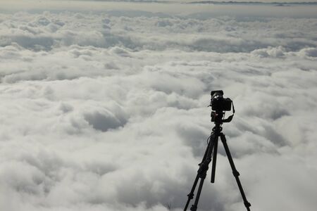 Camara set for taking photograph of cloud in the valleyの写真素材