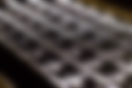 Blurred computer keyboard as the backgroundの写真素材