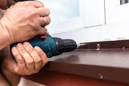 Construction work - drilling holes. High quality photoの写真素材