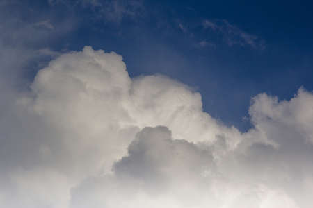 Dramatic cloudy sky. Fluffy clouds. High quality photo