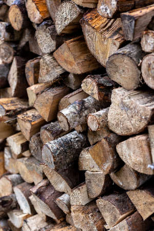 Chopped firewood stacked together. Fuel.