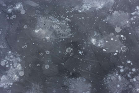 Gray wall with spots of paint. Decorative background.の写真素材