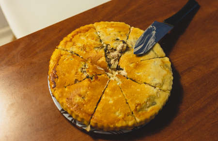 Homemade meat pie on the kitchen tableの写真素材