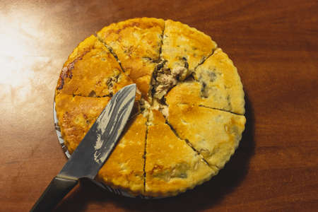 Homemade meat pie on the kitchen tableの写真素材