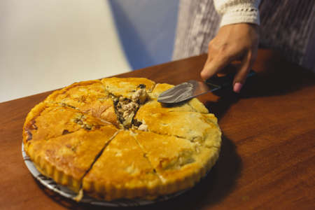 Homemade meat pie on the kitchen tableの写真素材