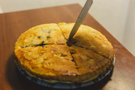 Homemade meat pie on the kitchen tableの写真素材