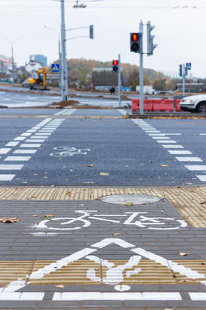 Bicycle path passing through the pedestrian crossing.の写真素材