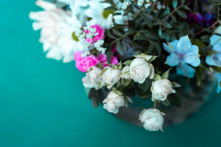 Bouquet of flowers on a blue background. Blooming flowers.の写真素材