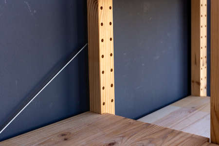 Wooden simple shelves for storing things in the apartmentの写真素材