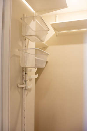 White Mesh Metal Shelves for Closet Storageの写真素材