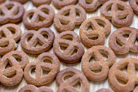 Cookies with sugar sprinkles on a wooden tableの写真素材