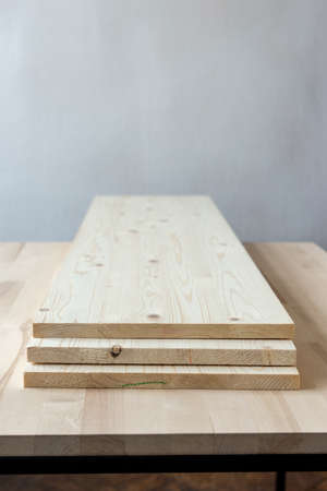 Wooden furniture board. Wooden building material. Glued board.