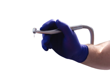 Drill for dental treatment in dentists handの写真素材