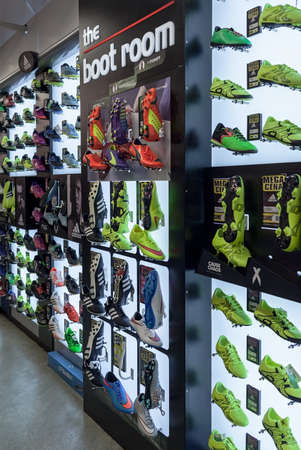 LJUBLJANA, SLOVENIA - SEPTEMBER 18, 2015: Photo shows a soccer shoes display wall at the SPORT 2000 store. In the picture are mainly shown the Adidas and Puma examples.のeditorial素材