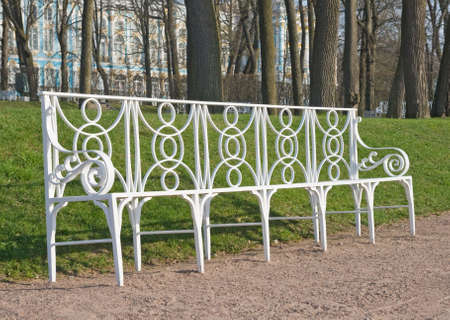 Laced metal bench in a park lane, town of Pushkin, Russiaの写真素材