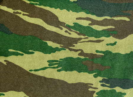 Close-up of a piece of camouflage clothの写真素材